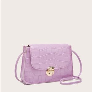 Pink crocodile purse